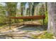 Covered carport with a concrete floor and metal supports, provides a practical solution for vehicle protection at 2255 Beecher Sw Rd, Atlanta, GA 30311