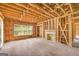 A spacious framed living room featuring a fireplace and large windows, ready for customization at 2255 Beecher Sw Rd, Atlanta, GA 30311