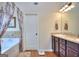 Full bathroom featuring a tub, shower, and granite vanity at 1058 Hartwell Rd, Locust Grove, GA 30248