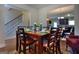 Cozy dining area adjacent to the kitchen, perfect for Gathering meals and gatherings at 1058 Hartwell Rd, Locust Grove, GA 30248
