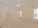 Spacious bedroom with carpet, ceiling fan, and attached bathroom at 325 Autumn Glen Cir, Fayetteville, GA 30215