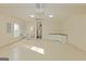 Large garage featuring a utility sink, washer and dryer hookups, cabinets, and epoxy flooring at 325 Autumn Glen Cir, Fayetteville, GA 30215