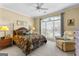 Cozy bedroom boasts a plush bed, soft carpet, natural light, and tranquil ambiance for relaxation at 365 Grand Teton Cir, Fayetteville, GA 30215