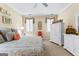 Comfortable bedroom with a king bed, two windows with white shutter panels, and white dressers at 365 Grand Teton Cir, Fayetteville, GA 30215