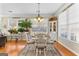 Bright dining room with hardwood floors, and a beautiful view through bright windows at 365 Grand Teton Cir, Fayetteville, GA 30215