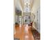 Spacious foyer with hardwood floors, chandelier, and an open entrance creates a warm and inviting atmosphere at 365 Grand Teton Cir, Fayetteville, GA 30215