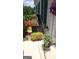 Beautiful garden area featuring a planter with colorful flowers and an outdoor storage cabinet at 365 Grand Teton Cir, Fayetteville, GA 30215