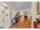 Hallway showing views of a laundry room, living room, and decorative furnishings at 365 Grand Teton Cir, Fayetteville, GA 30215