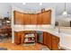 Bright kitchen featuring wood cabinets with stainless steel appliances and eat in bar at 365 Grand Teton Cir, Fayetteville, GA 30215