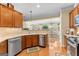 Functional kitchen with stainless steel appliances and a view to dining area at 365 Grand Teton Cir, Fayetteville, GA 30215