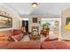 Cozy living room showcasing comfortable seating, a fireplace, and natural light with an open floor plan at 365 Grand Teton Cir, Fayetteville, GA 30215