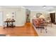 Inviting living room showcasing hardwood floors and ample natural light with comfortable seating at 365 Grand Teton Cir, Fayetteville, GA 30215