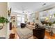 Cozy living room boasts natural light and hardwood floors, with a fireplace focal point at 365 Grand Teton Cir, Fayetteville, GA 30215