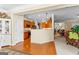 Spacious open concept layout of a kitchen and dining area with wood floors at 365 Grand Teton Cir, Fayetteville, GA 30215