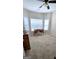 Bright bedroom showcasing neutral walls and carpeted flooring, enhanced by natural light and a ceiling fan at 248 Valley Way, Hampton, GA 30228