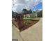 Brick mailbox with landscaped flowerbed leading to a single-story home at 248 Valley Way, Hampton, GA 30228