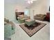 Spacious living room with vaulted ceiling, plush seating, and decorative area rug at 248 Valley Way, Hampton, GA 30228