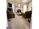 Bright living room featuring fireplace, neutral carpet, and natural light at 248 Valley Way, Hampton, GA 30228