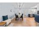 Bright dining area with hardwood floors, modern fixtures, and stylish furniture at 1022 Miss Amber Way, Locust Grove, GA 30248