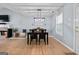 Traditional dining room with light walls, light wood floor, and a dark wood table set at 1022 Miss Amber Way, Locust Grove, GA 30248