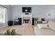 Inviting living room with a brick fireplace, vaulted ceilings, and a large sofa at 1022 Miss Amber Way, Locust Grove, GA 30248