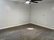 Bedroom features a ceiling fan, carpet floors, fresh white trim and neutral-colored walls at 20 Fairway Ln, Peachtree City, GA 30269