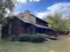 Exterior view of home featuring a private deck and traditional architecture at 20 Fairway Ln, Peachtree City, GA 30269