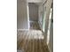 Open room highlighting new floors, modern slider, and neutral tones at 20 Fairway Ln, Peachtree City, GA 30269