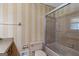 Bathroom with toilet and glass doored shower at 426 Old Senoia Rd, Fayetteville, GA 30215