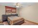 Bedroom with carpet, a ceiling fan, window and neutral walls at 426 Old Senoia Rd, Fayetteville, GA 30215