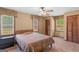 Bedroom with carpet, a ceiling fan, window and neutral walls at 426 Old Senoia Rd, Fayetteville, GA 30215