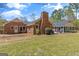 Well-maintained single-story brick home with a cozy sunroom and large yard at 426 Old Senoia Rd, Fayetteville, GA 30215
