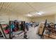 Insulated garage with overhead lighting and concrete floor, providing ample storage space for tools and equipment at 426 Old Senoia Rd, Fayetteville, GA 30215