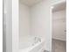 Bathroom features a soaking tub and leads into a walk-in closet at 301 Limestone Circle, Conyers, GA 30013