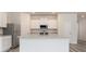 Modern kitchen features granite counters, stainless steel appliances and wood-look floors at 301 Limestone Circle, Conyers, GA 30013