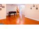 Finished basement features laminate wood flooring, game table, and staircase at 801 Streamside Dr, Mcdonough, GA 30252