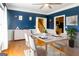 Formal dining room features hardwood floors, decor, and natural light at 801 Streamside Dr, Mcdonough, GA 30252