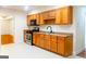 Kitchen featuring stainless steel appliances and hardwood cabinets at 801 Streamside Dr, Mcdonough, GA 30252
