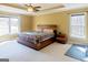 Bright main bedroom with tray ceiling and great natural light at 801 Streamside Dr, Mcdonough, GA 30252