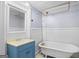 Charming bathroom featuring a clawfoot tub and stylish vanity with traditional fixtures at 85 Bryan St, Mcdonough, GA 30253