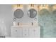 Bright bathroom showcasing a double vanity, modern fixtures, a glass-enclosed shower, and gray tiling at 85 Bryan St, Mcdonough, GA 30253