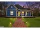 Charming two-story home with a brick pathway and manicured lawn at 85 Bryan St, Mcdonough, GA 30253