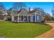 Charming two-story home with a manicured lawn and inviting curb appeal at 85 Bryan St, Mcdonough, GA 30253
