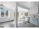 Open-concept kitchen and dining area with stainless steel appliances and ample natural light at 85 Bryan St, Mcdonough, GA 30253