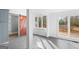Bright kitchen with a sliding barn door that leads to the deck at 85 Bryan St, Mcdonough, GA 30253