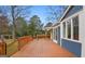 Expansive wooden deck offering ample space for outdoor seating and relaxation, with scenic views at 85 Bryan St, Mcdonough, GA 30253
