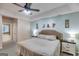 Spacious main bedroom showing bedside tables and the entry to the ensuite bath at 324 Sue Ct, Temple, GA 30179