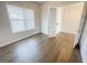 Office space featuring gorgeous wood floors, window and decorative french doors at 3695 Andover St, Cumming, GA 30028