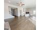 Expansive open concept living space with a modern kitchen, staircase, and seamless flow, perfect for Gathering living at 3695 Andover St, Cumming, GA 30028