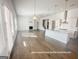 Spacious open-concept layout with a modern kitchen, dining area, and inviting living room, ideal for entertaining at 3695 Andover St, Cumming, GA 30028